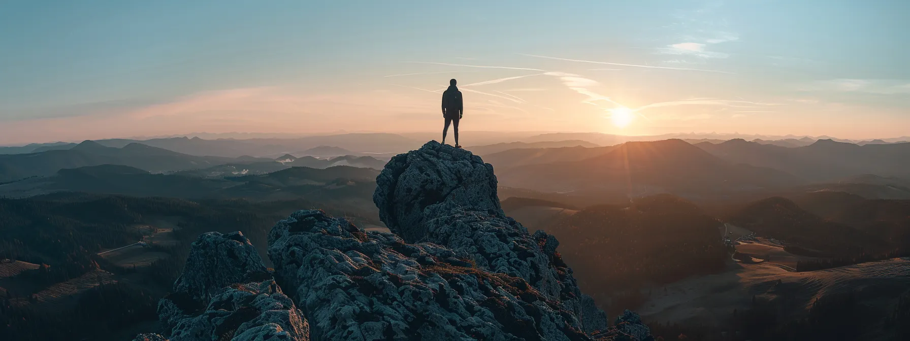 a person standing on top of a mountain, overlooking a vast landscape with prominent industry leaders standing beside them, symbolizing authority and dominance in the field of seo.